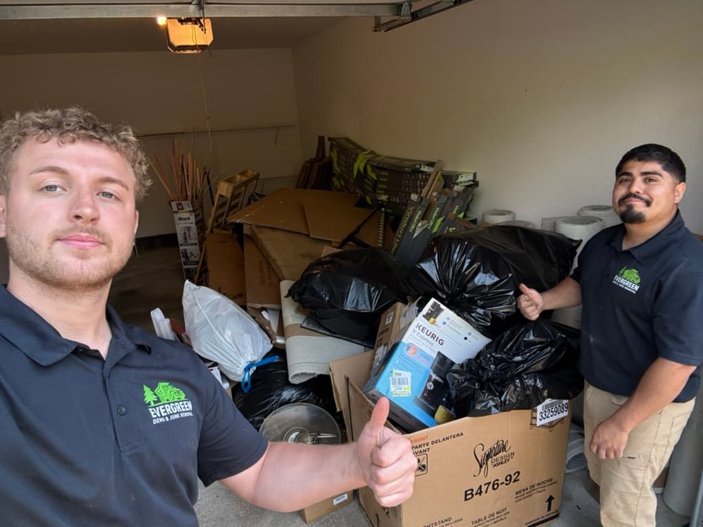 Austin and the Evergreen team completing a garage cleanout